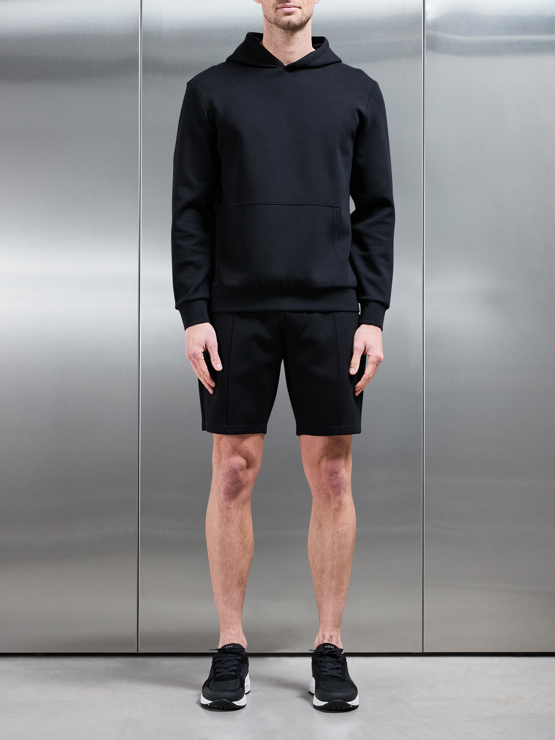 Interlock Jersey Essential Hoodie in Black