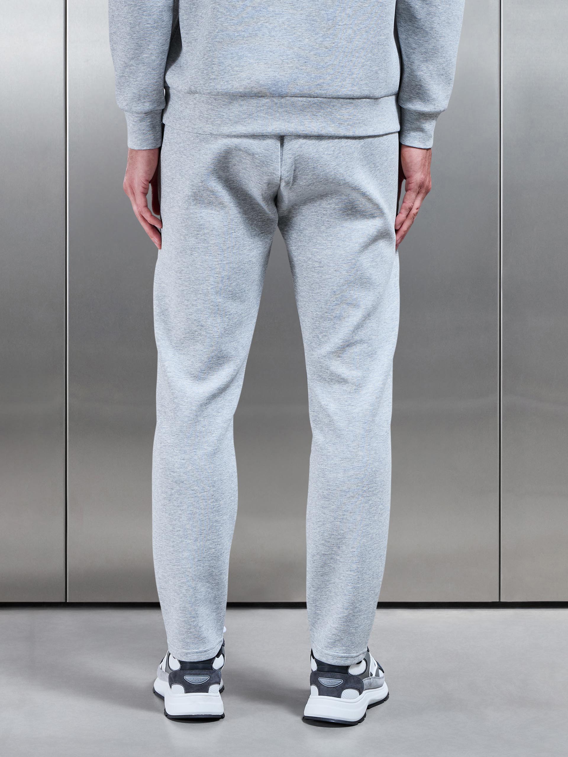 Interlock Jersey Essential Jogger in Marl Grey