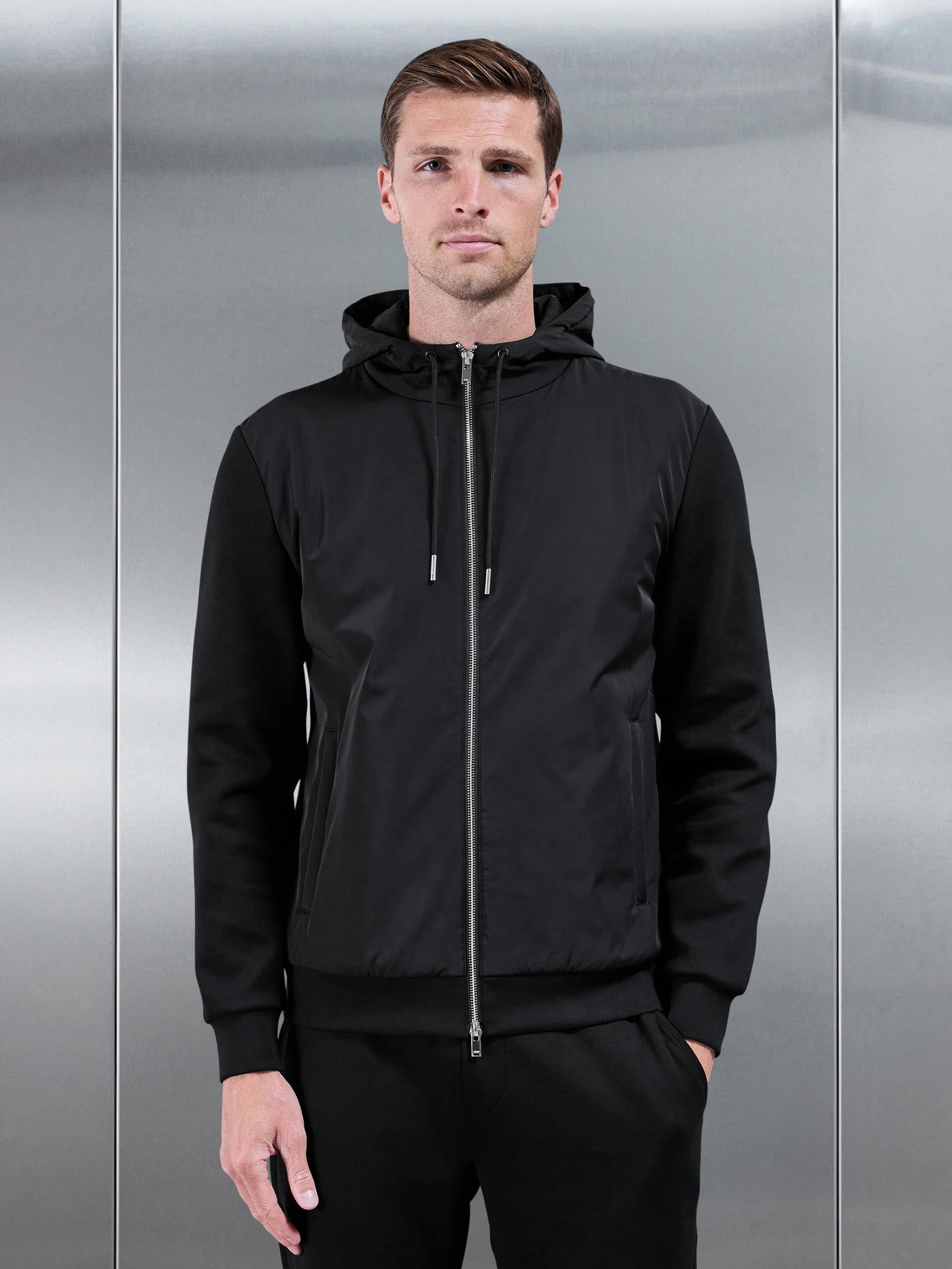 Interlock Jersey Hybrid Windbreaker in Black