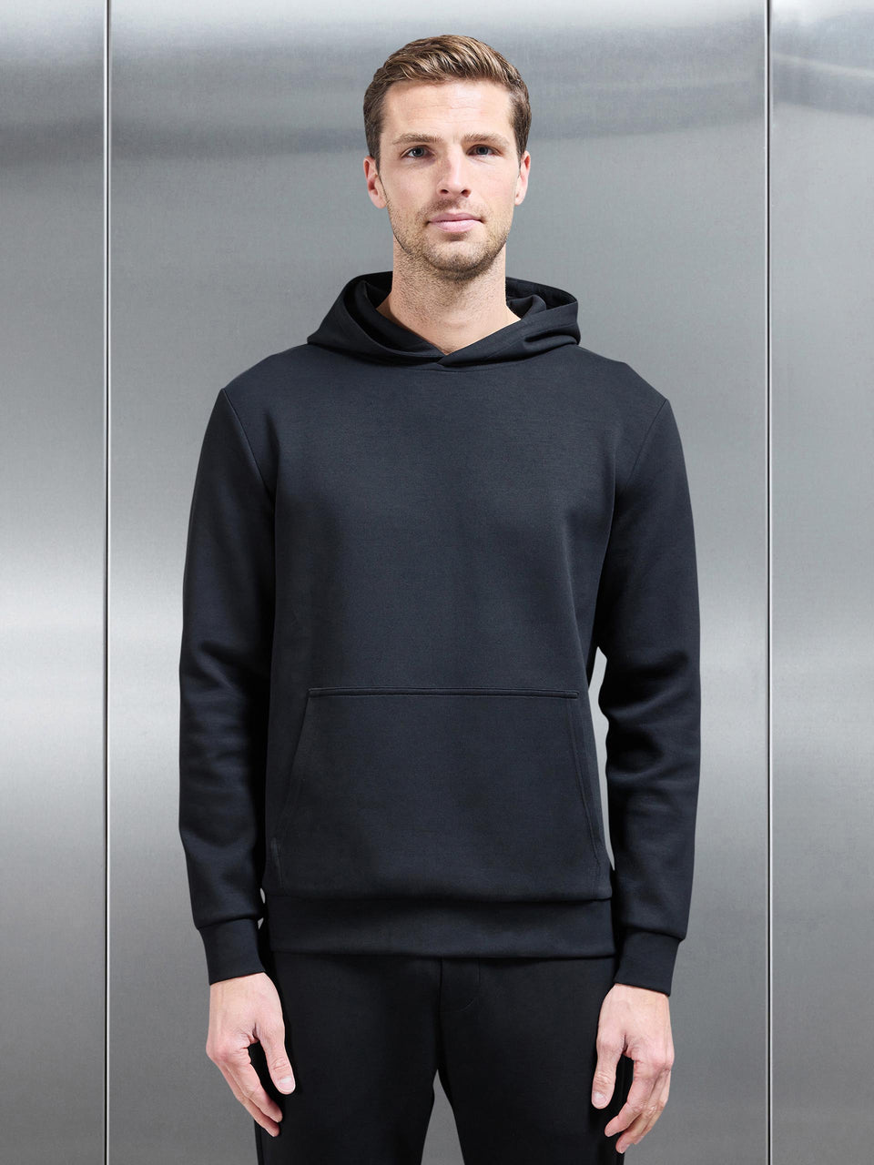Interlock Jersey Essential Hoodie in Black