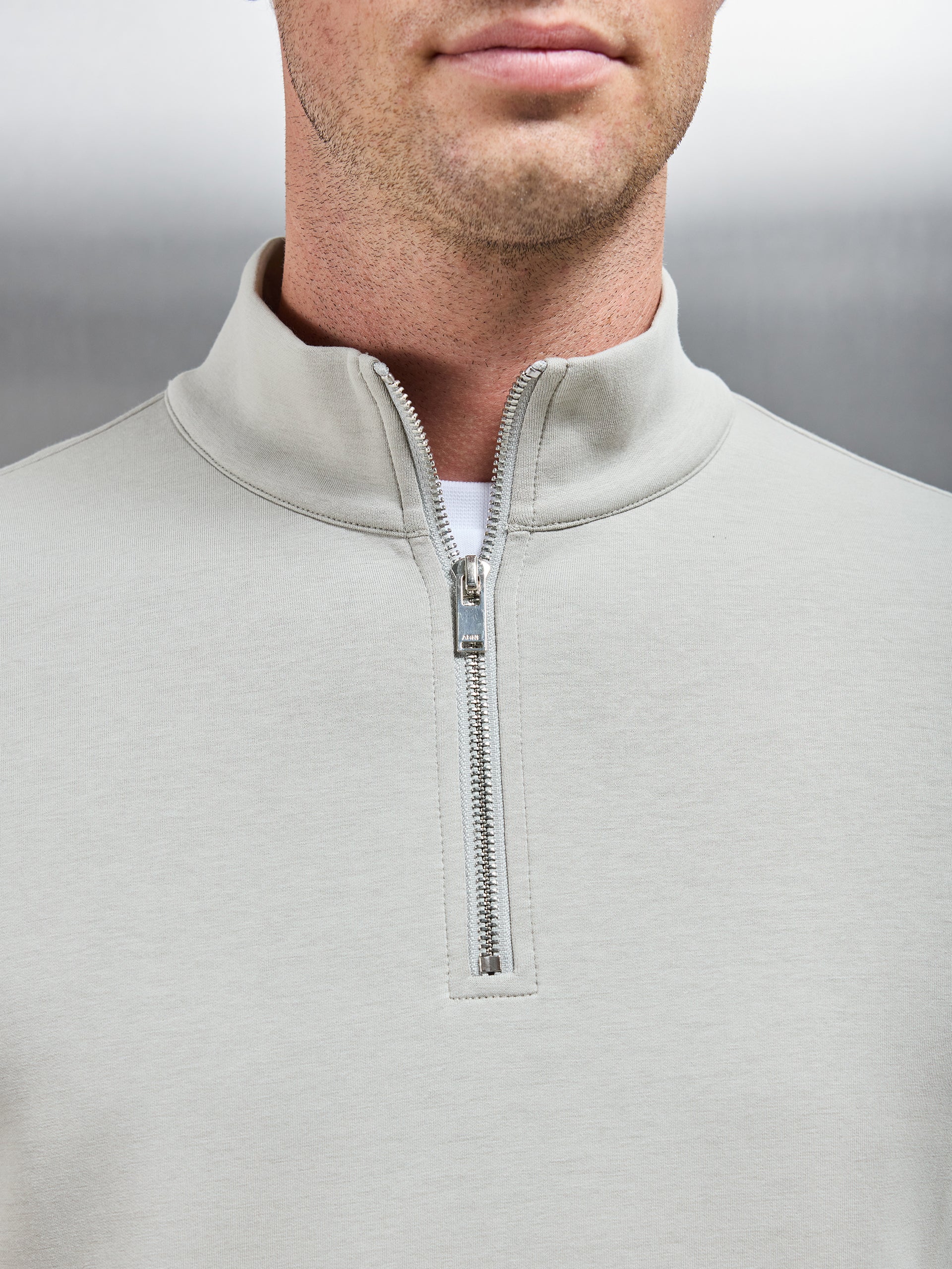 Interlock Jersey Half Zip in Stone