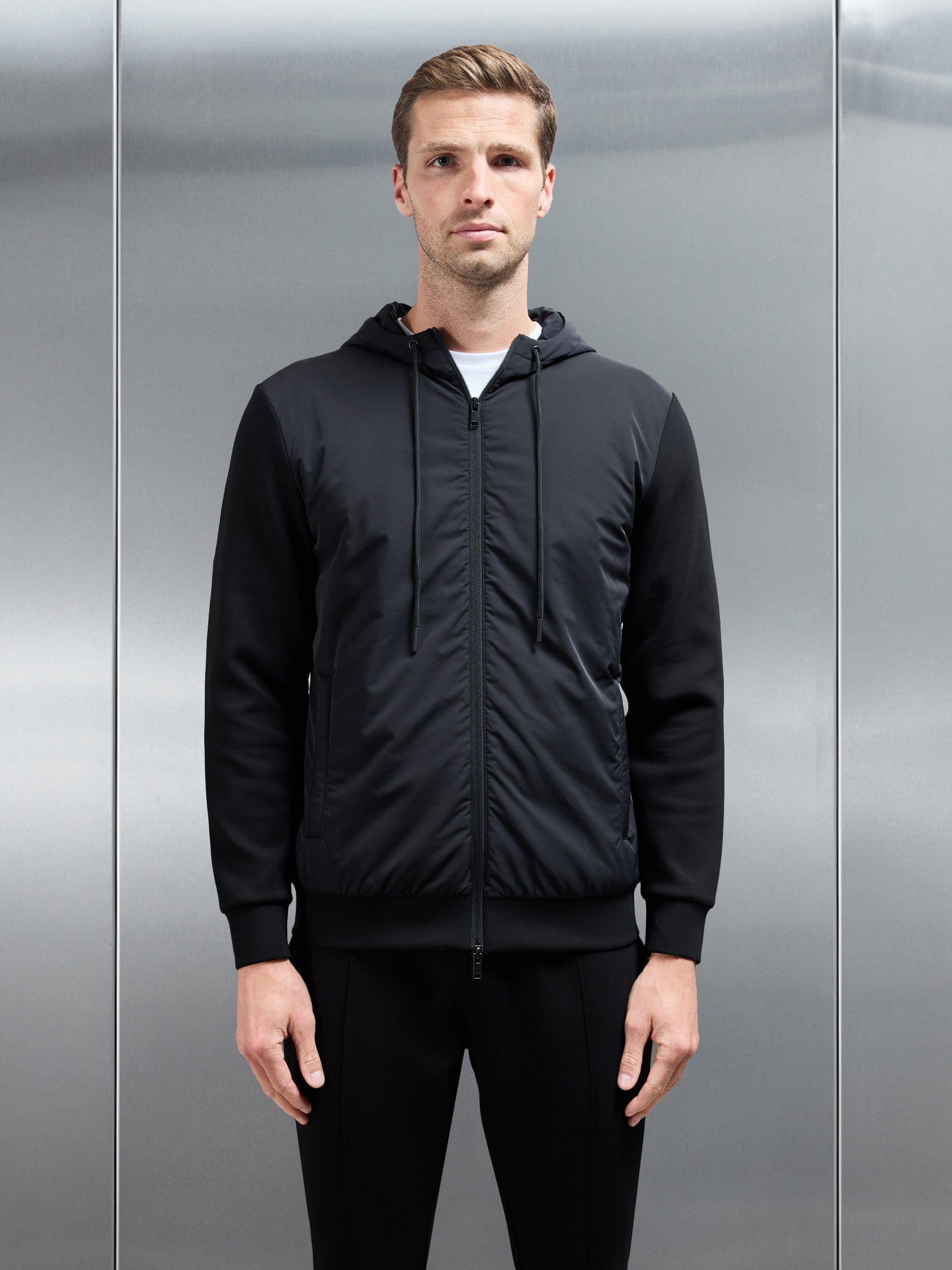 Interlock Jersey Hybrid Windbreaker in Black