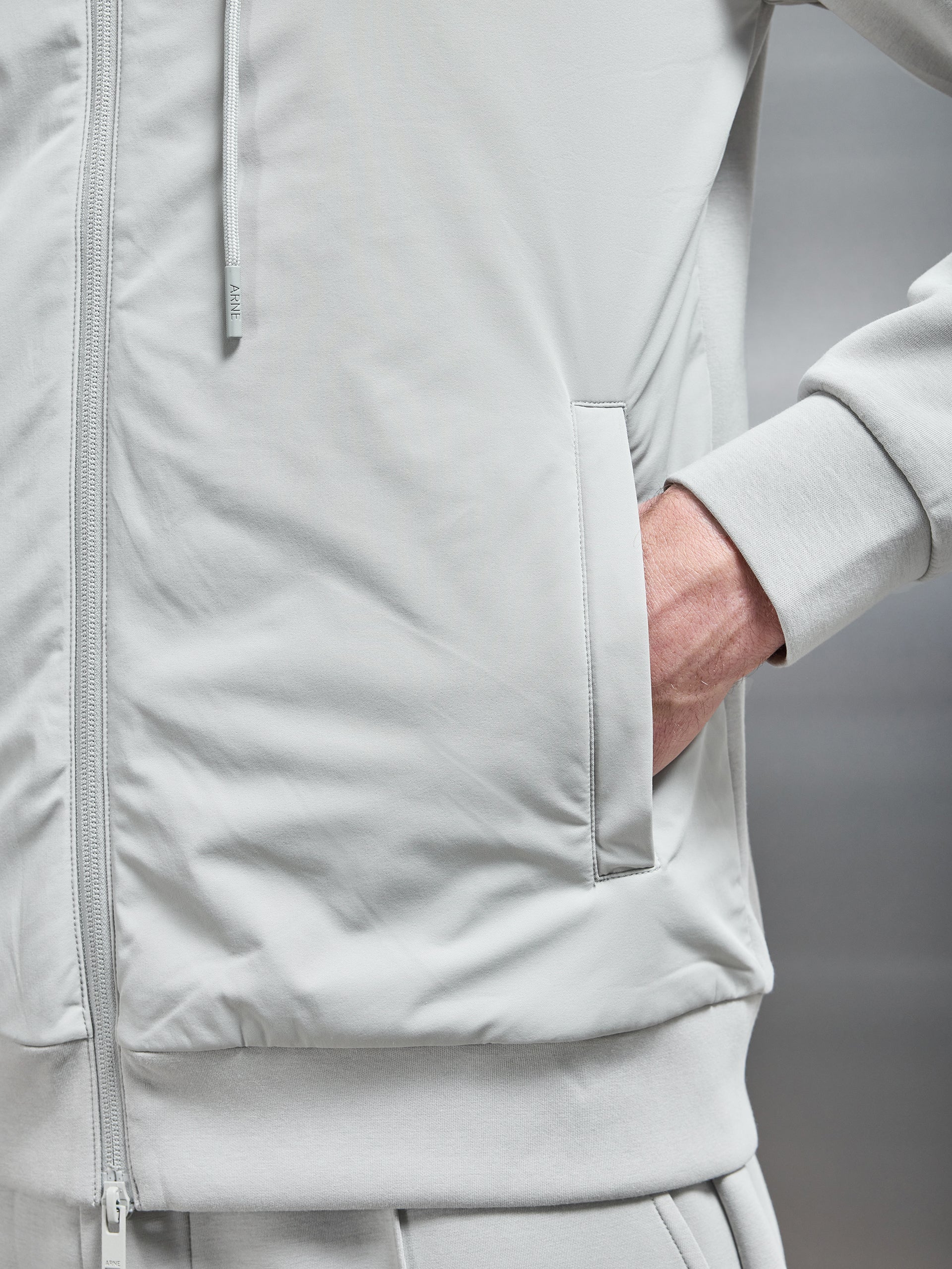 Interlock Jersey Hybrid Windbreaker in Stone