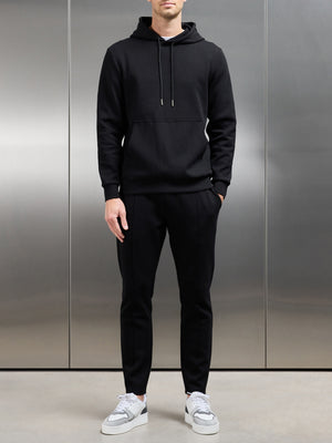 Interlock Jersey Tapered Jogger in Black