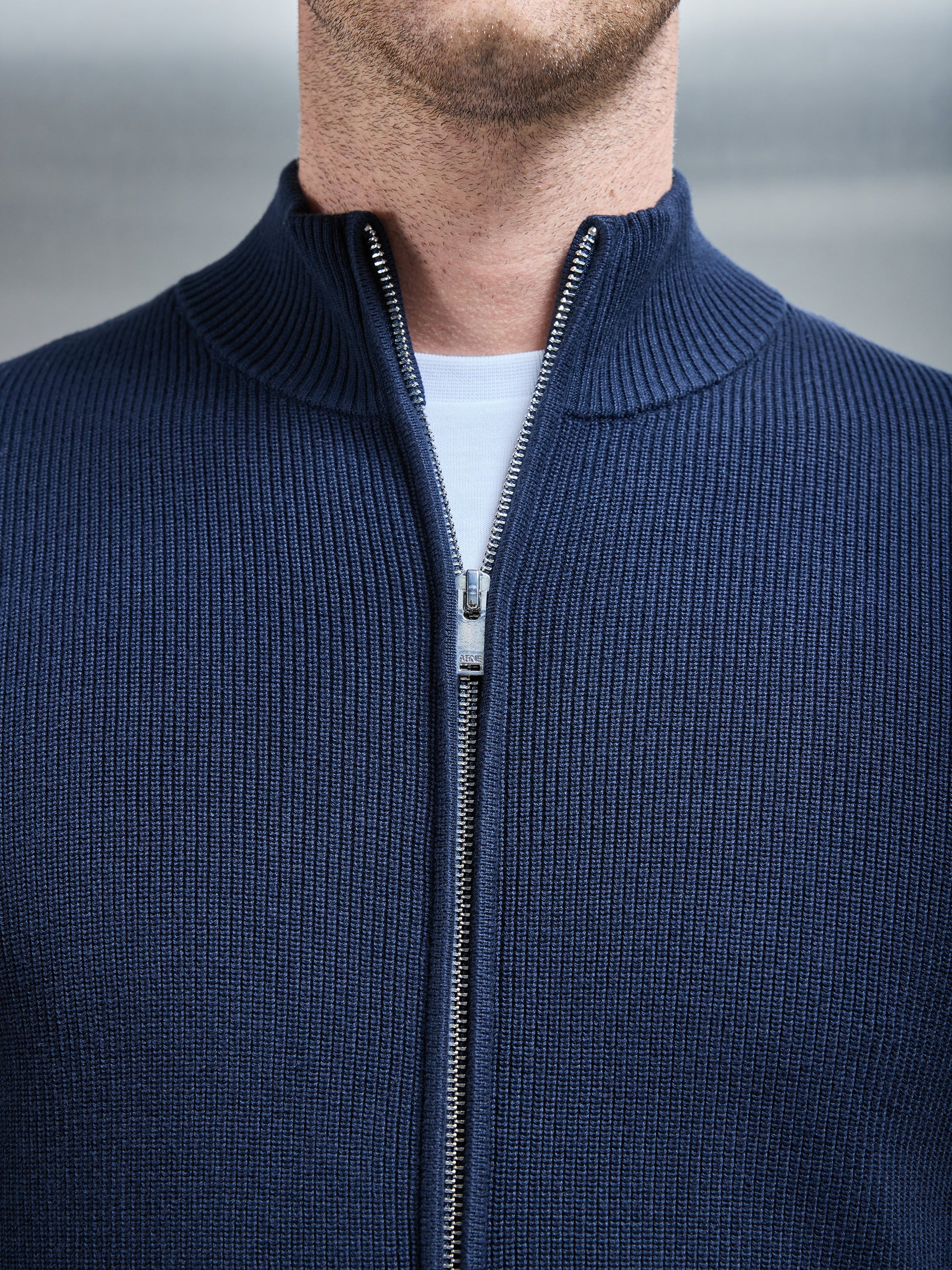 Knitted Ribbed Funnel Neck Zip Through Jacket in Navy