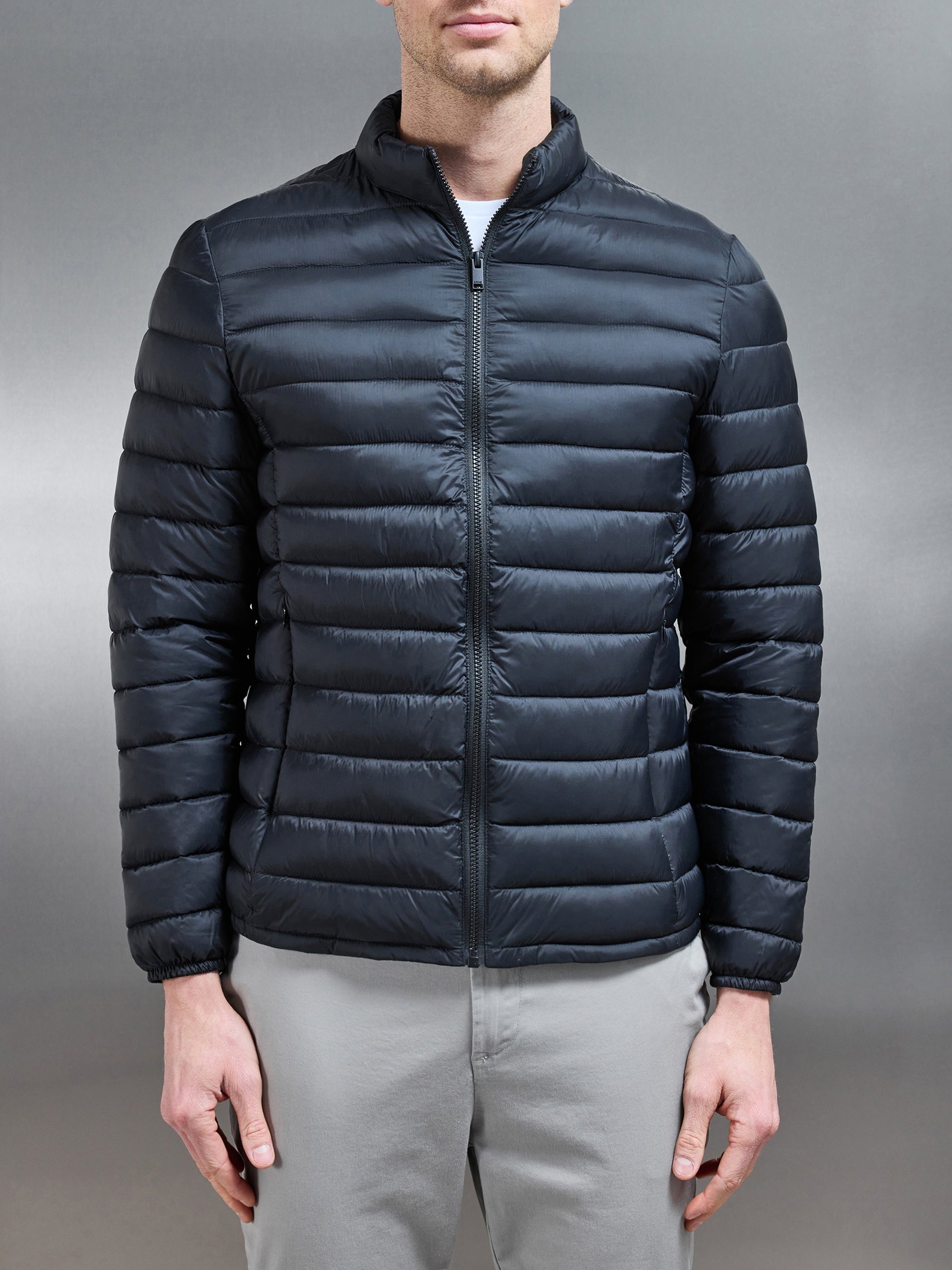 Lightweight Funnel Neck Puffer Jacket in Black