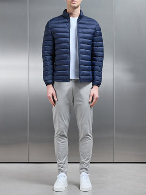 Lightweight Funnel Neck Puffer Jacket in Navy