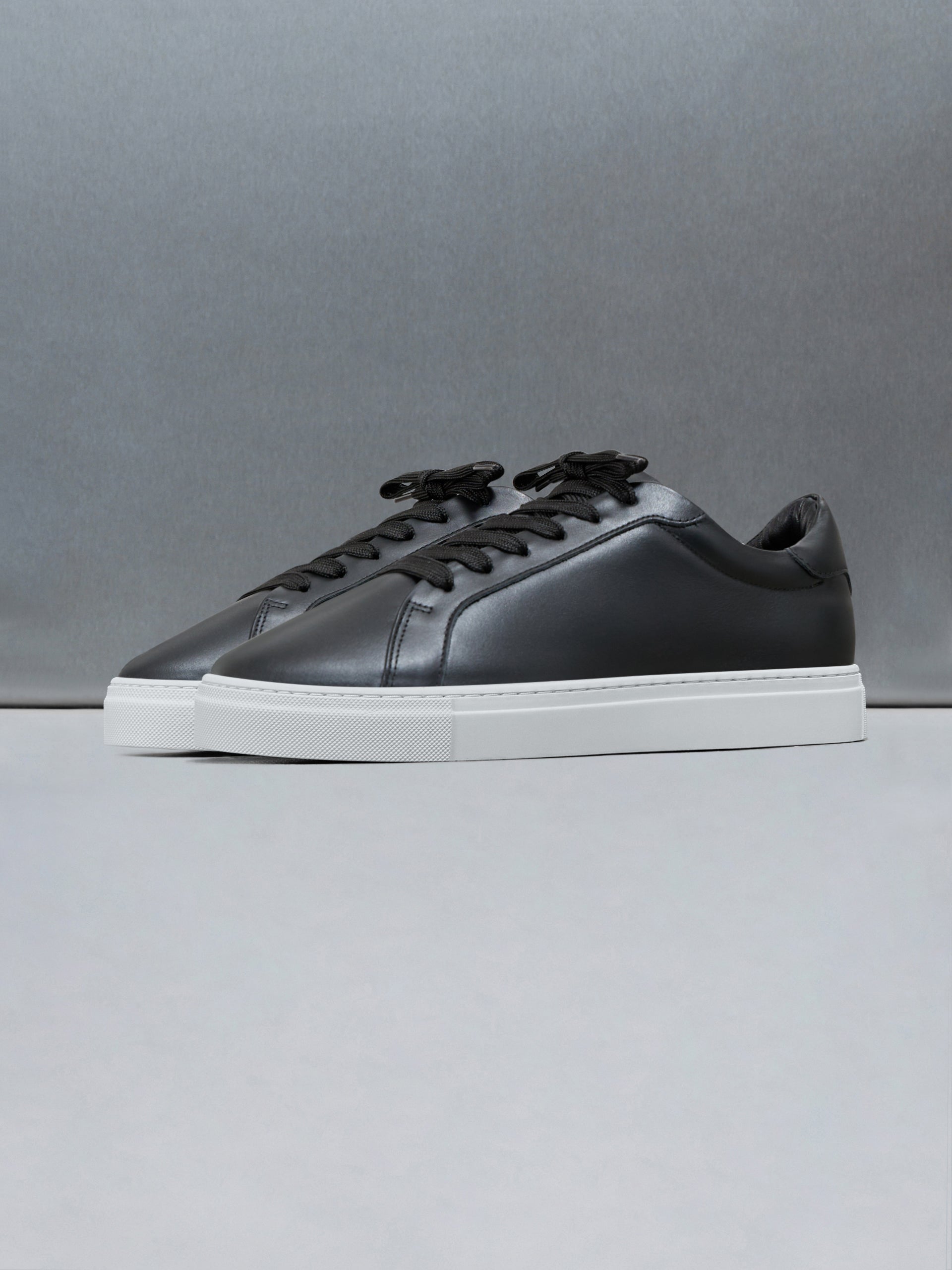 Low Essential Leather Trainer in Black