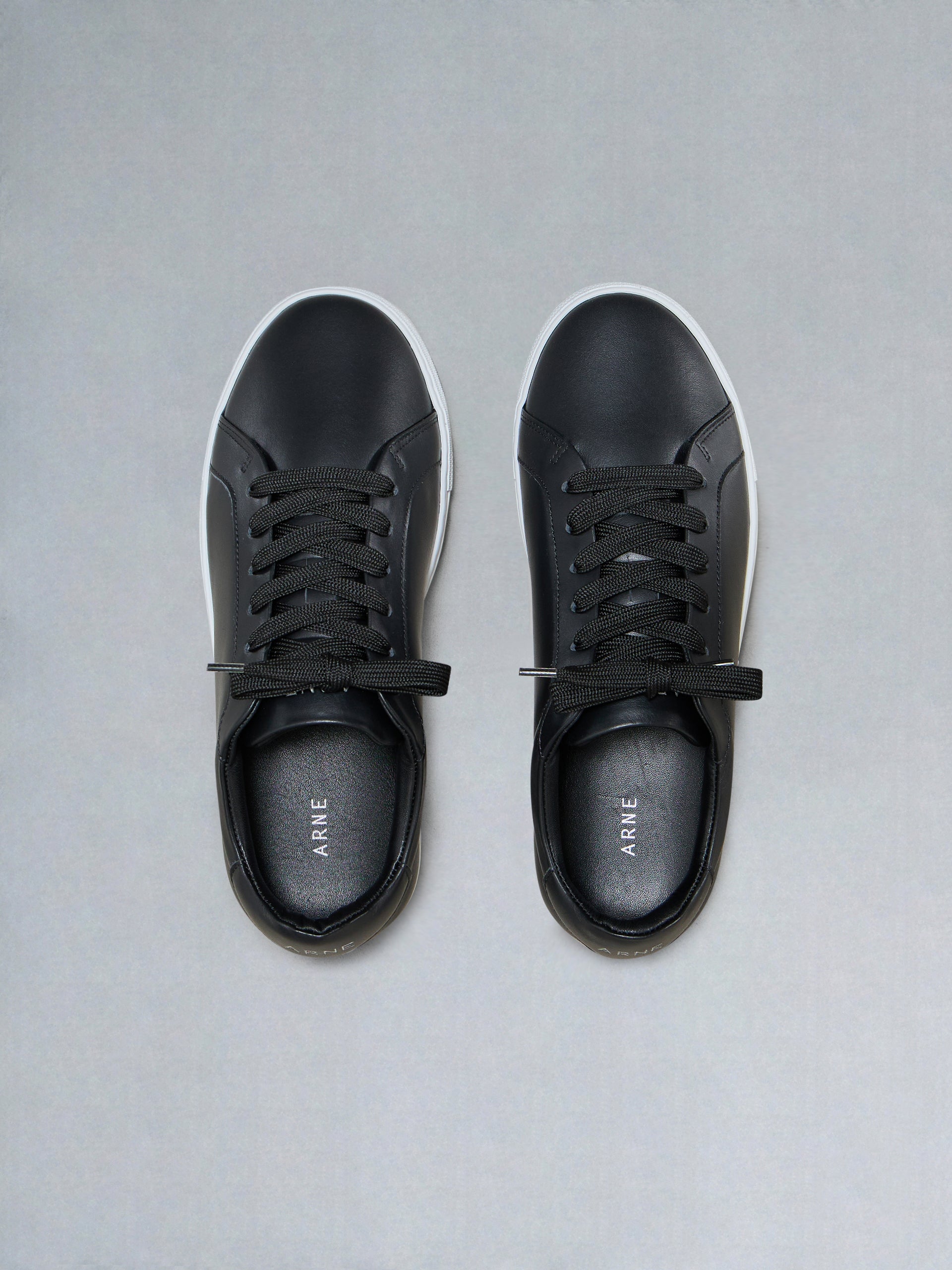Low Essential Leather Trainer in Black