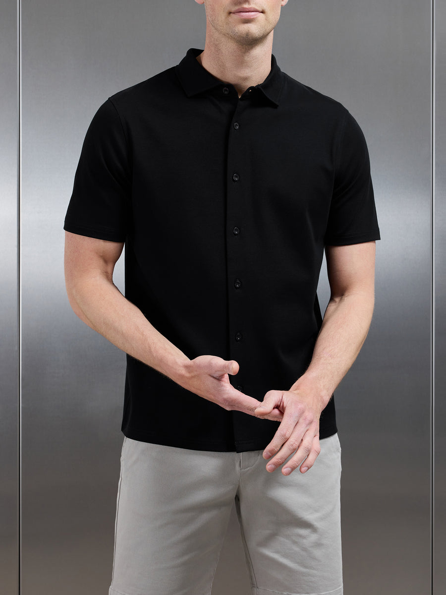 Mercerised Interlock Short Sleeve Button Through Shirt in Black