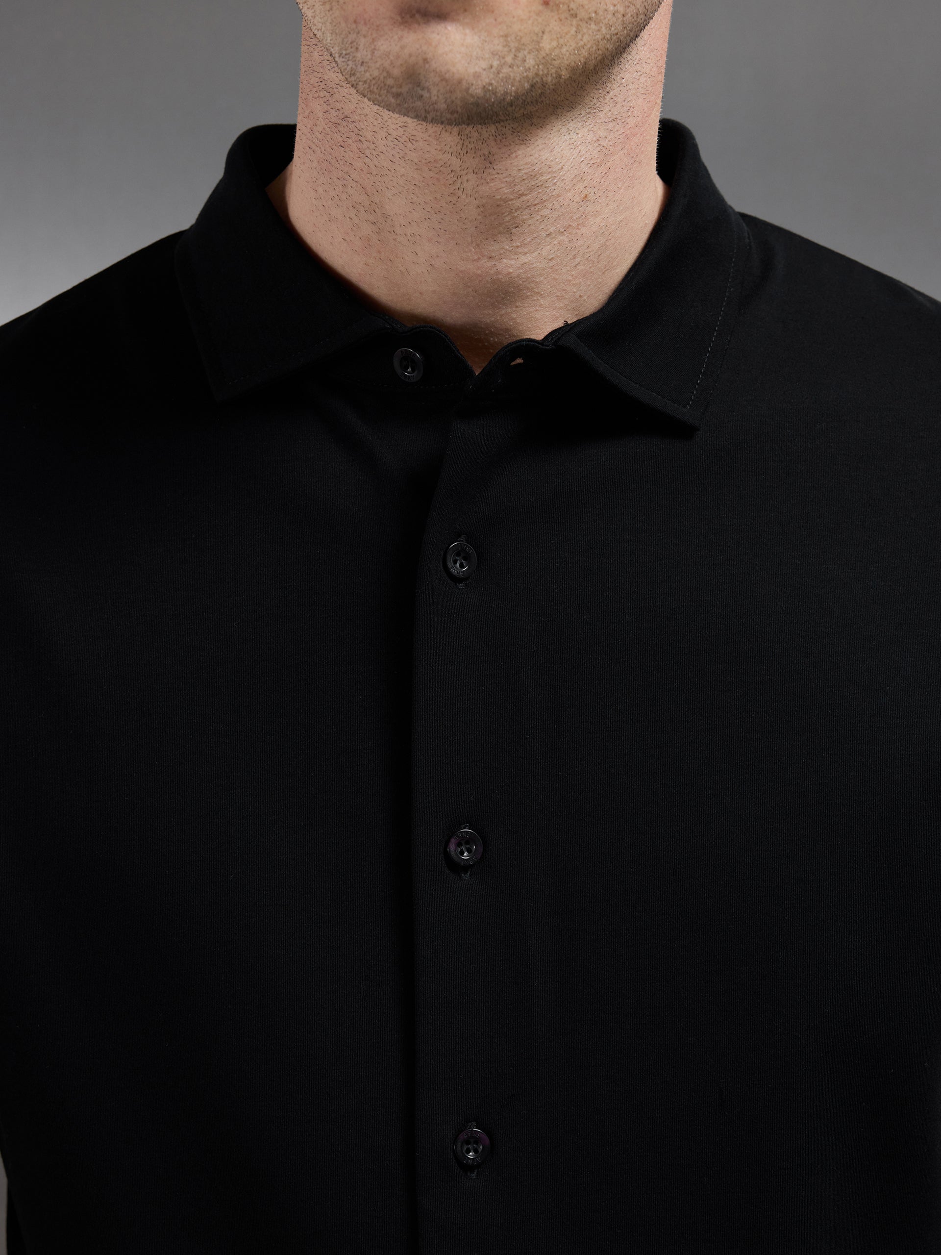 Mercerised Interlock Short Sleeve Button Through Shirt in Black