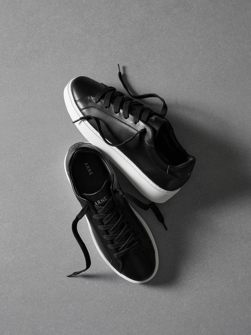 Mid Essential Leather Trainer in Black