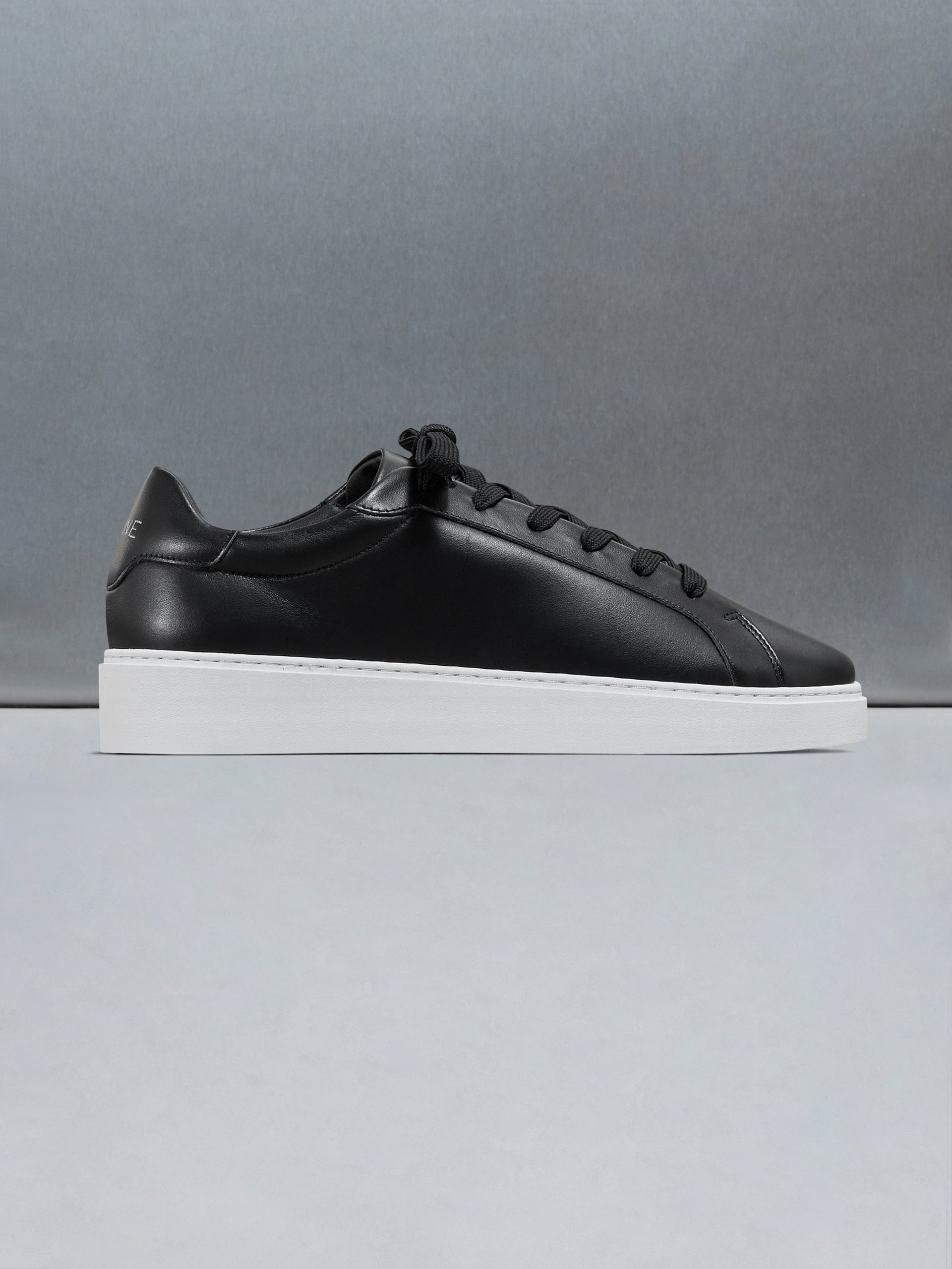 Mid Essential Leather Trainer in Black