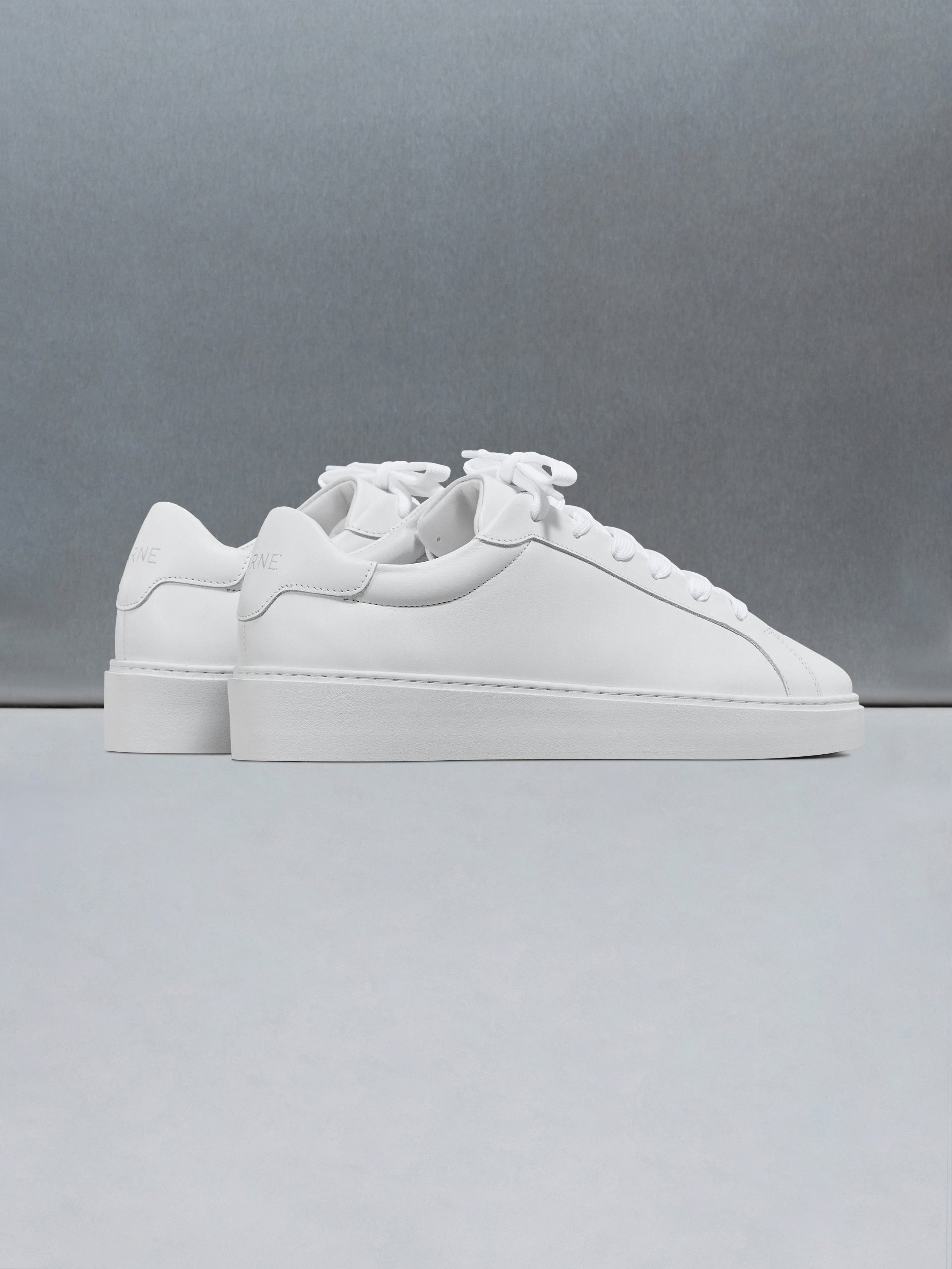 Mid Essential Leather Trainer in White