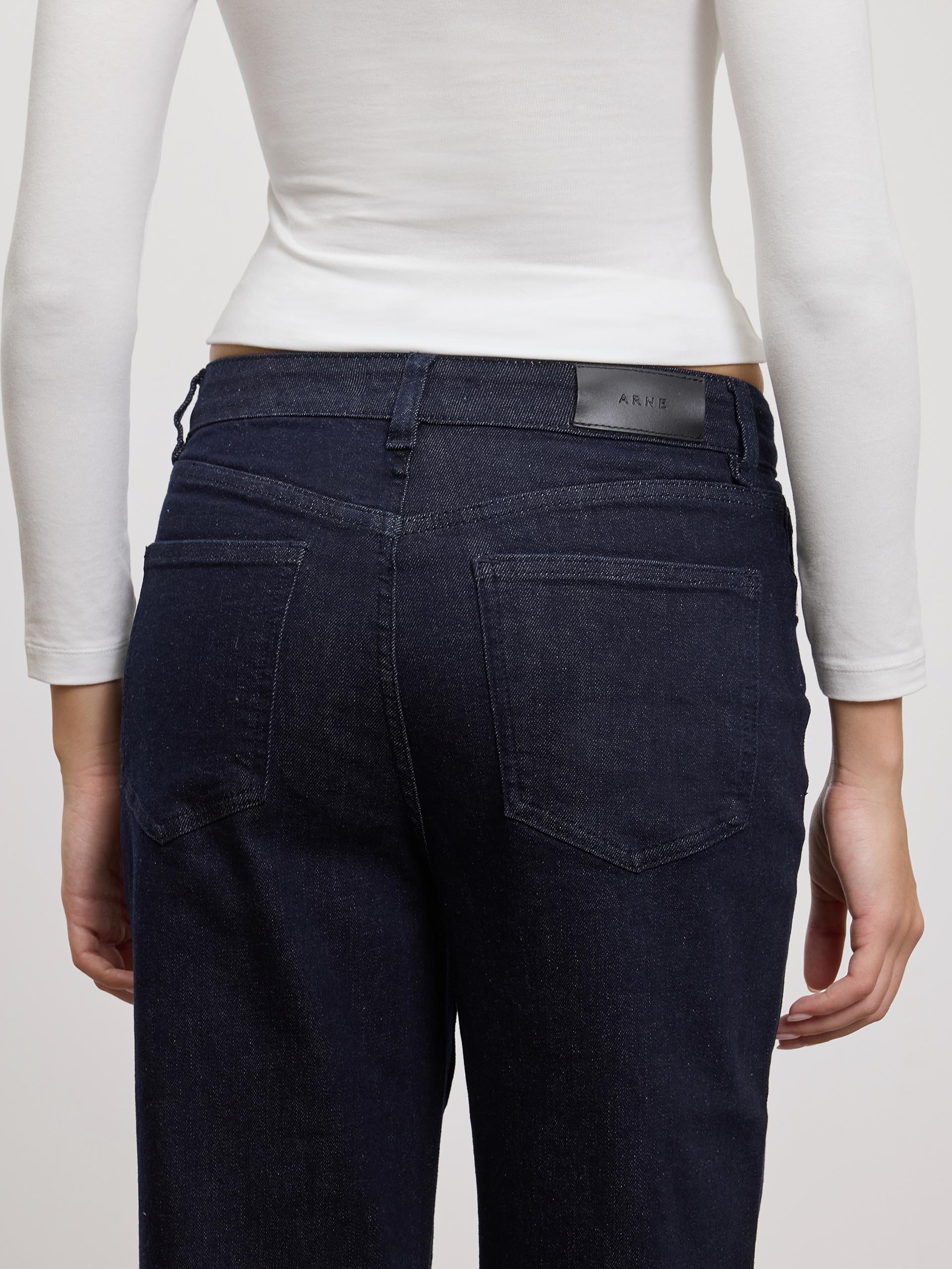 Womens Mid Rise Straight Denim Jeans in Solid Dark Blue