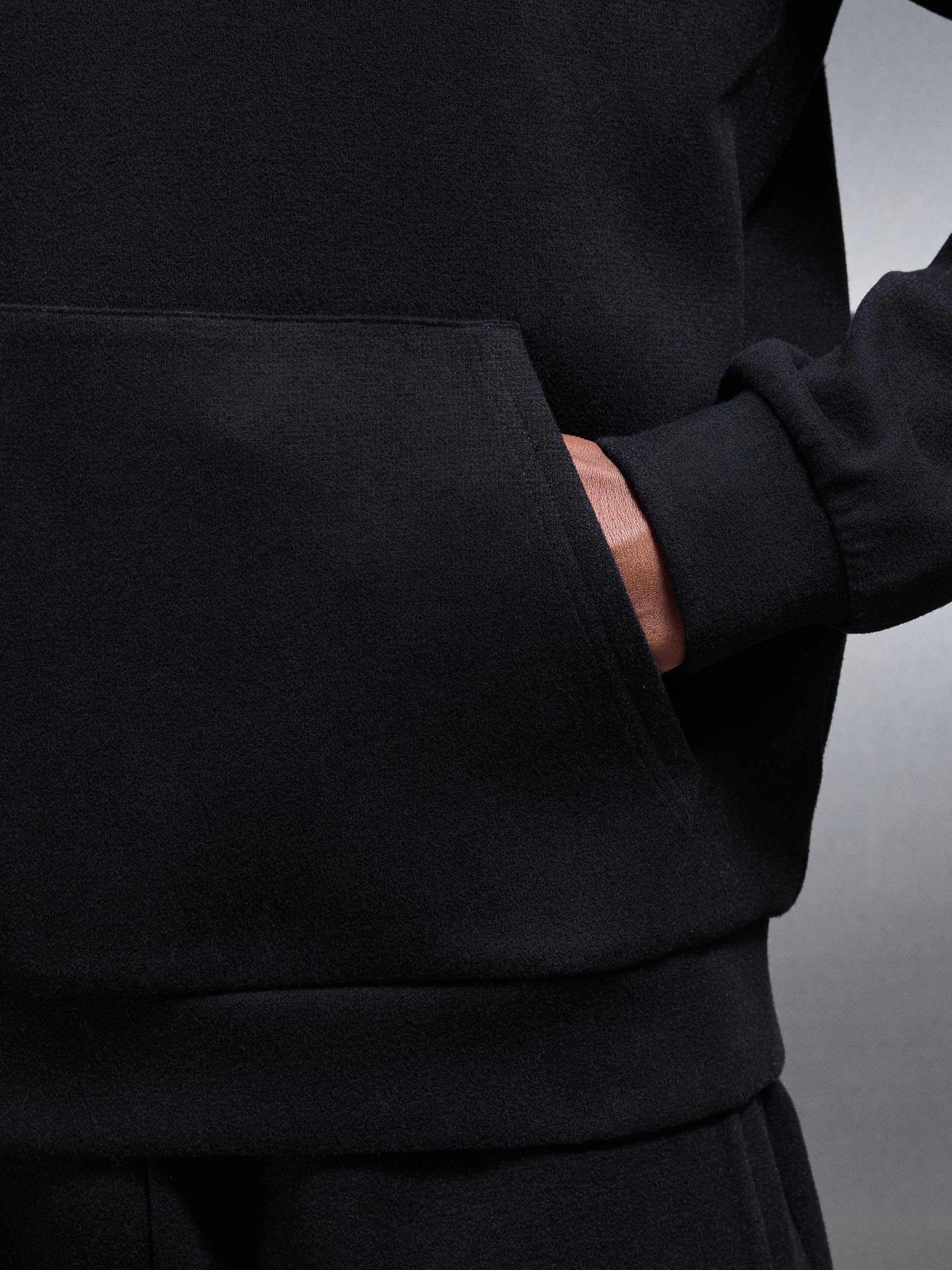Relaxed Fit Knitted Hoodie in Black