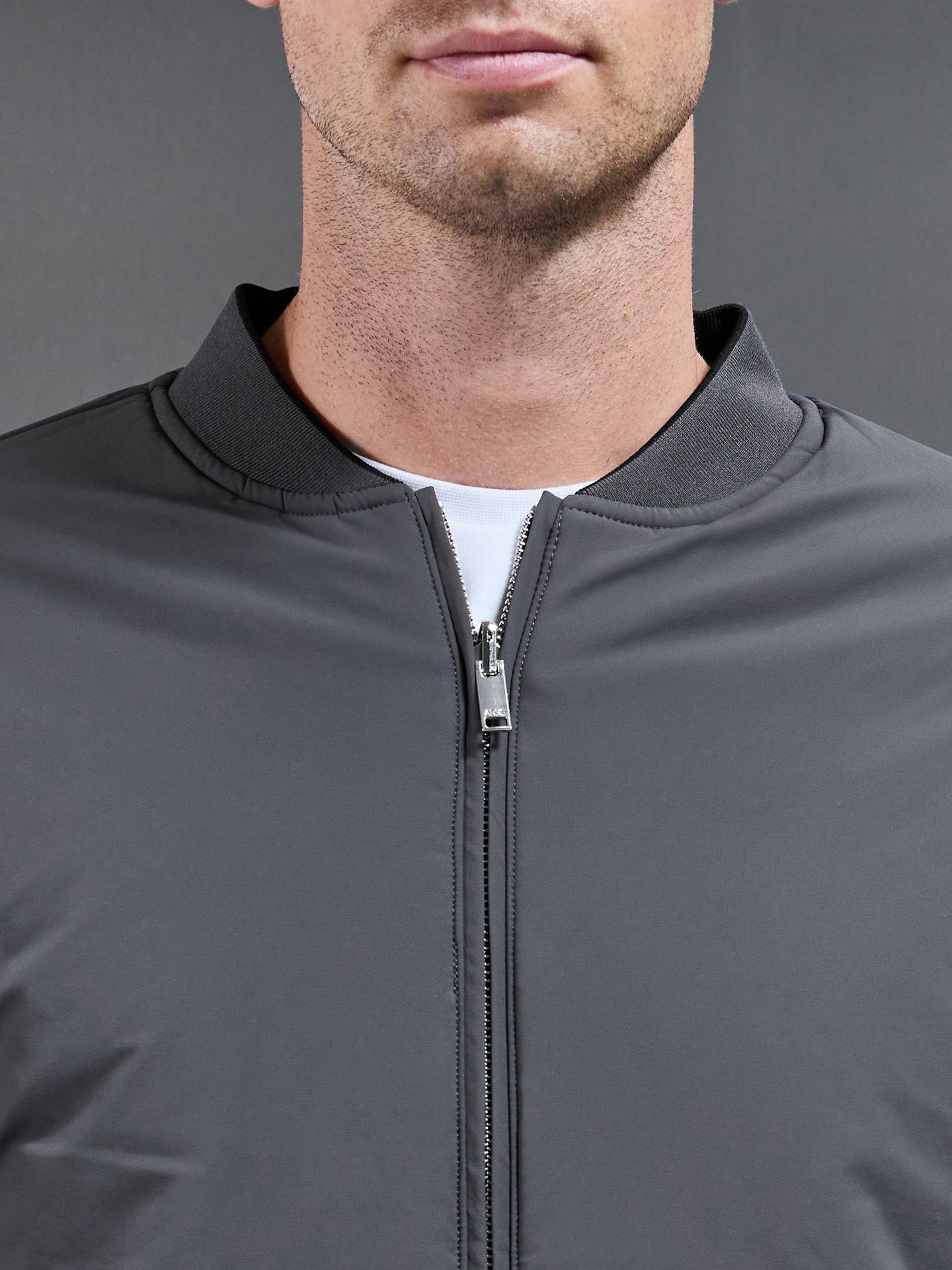Relaxed Padded Reversible Bomber Jacket in Black Grey