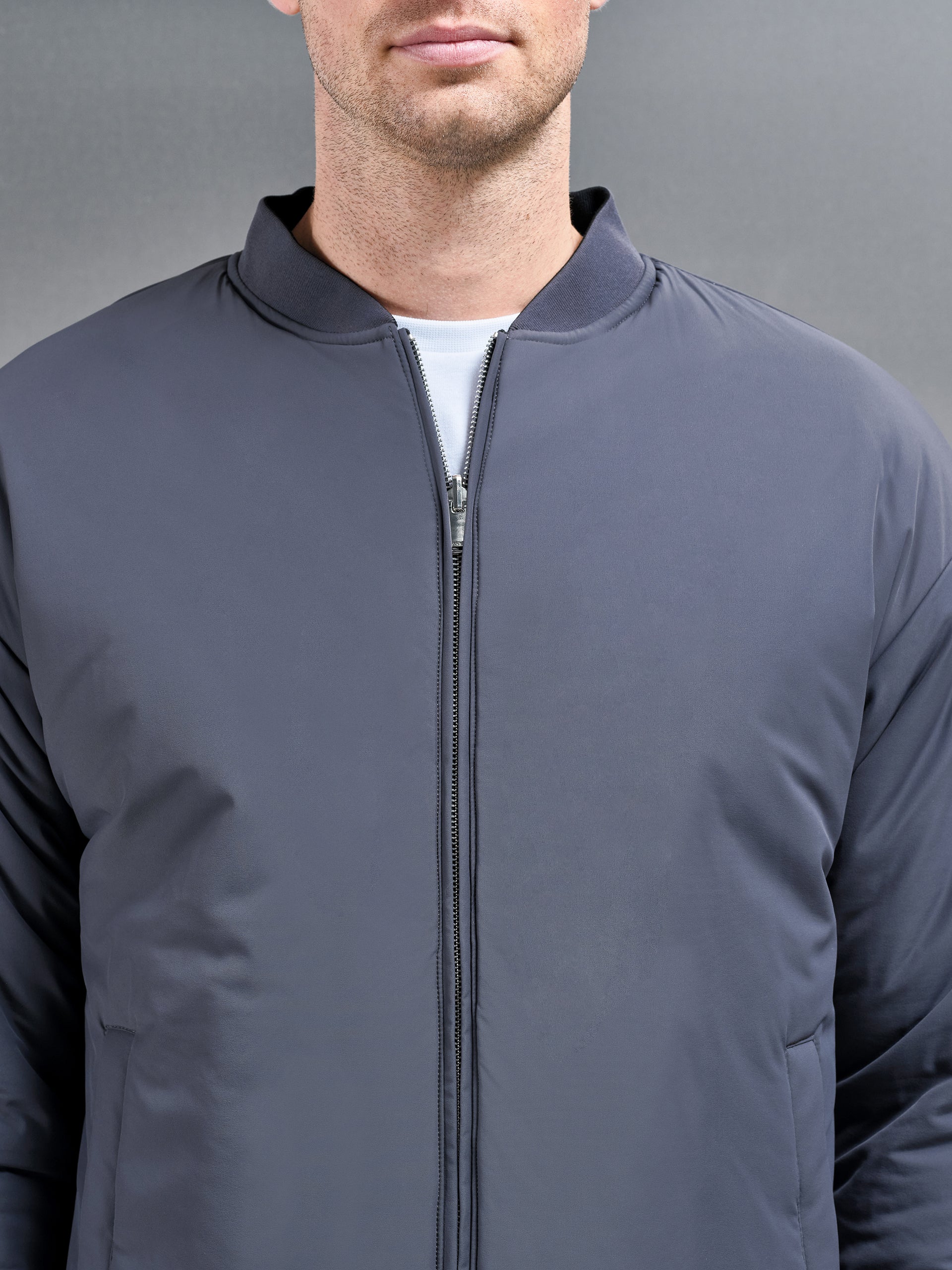 Relaxed Padded Reversible Bomber Jacket in Black Grey