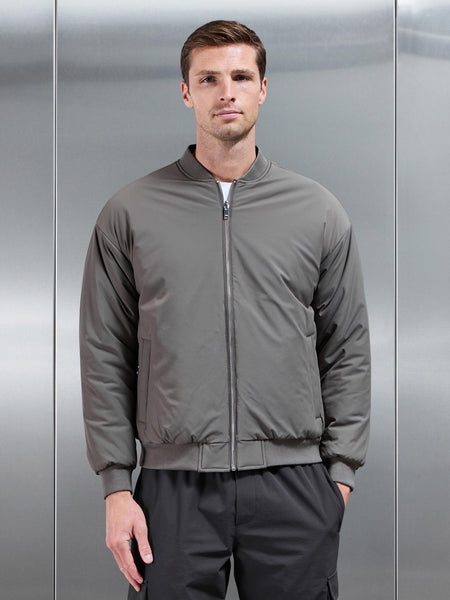 Relaxed Padded Reversible Bomber Jacket in Olive Navy