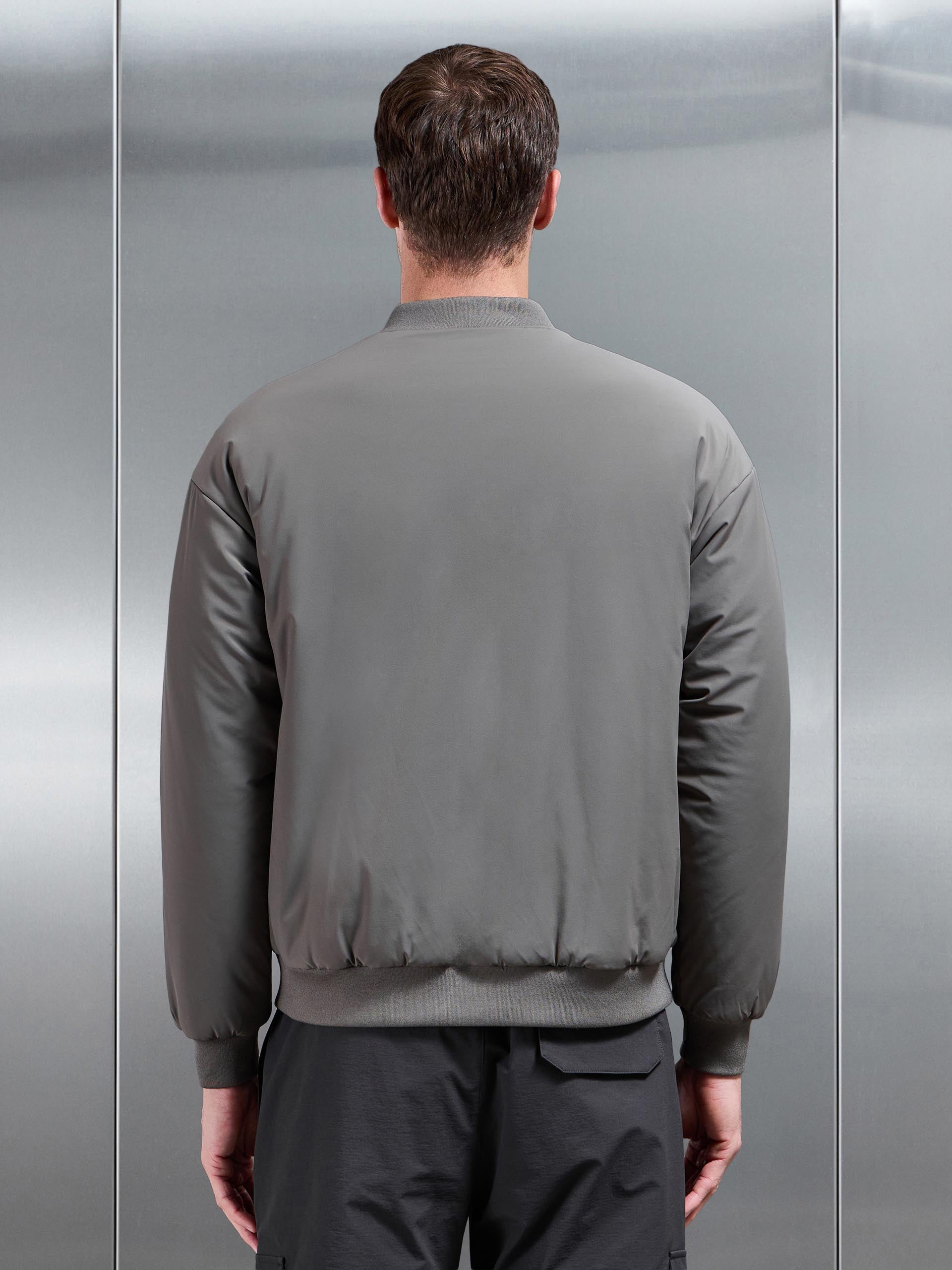 Relaxed Padded Reversible Bomber Jacket in Olive Navy