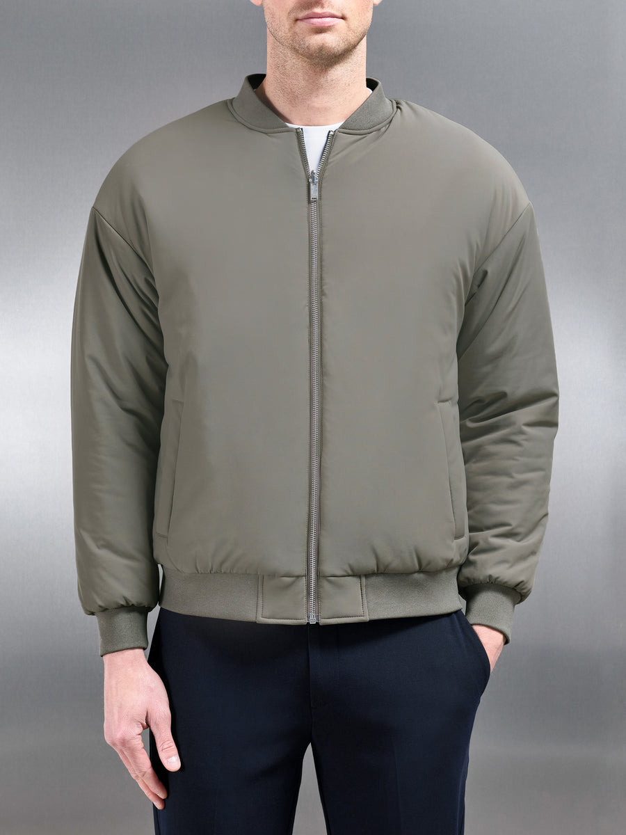 Relaxed Padded Reversible Bomber Jacket in Olive Navy