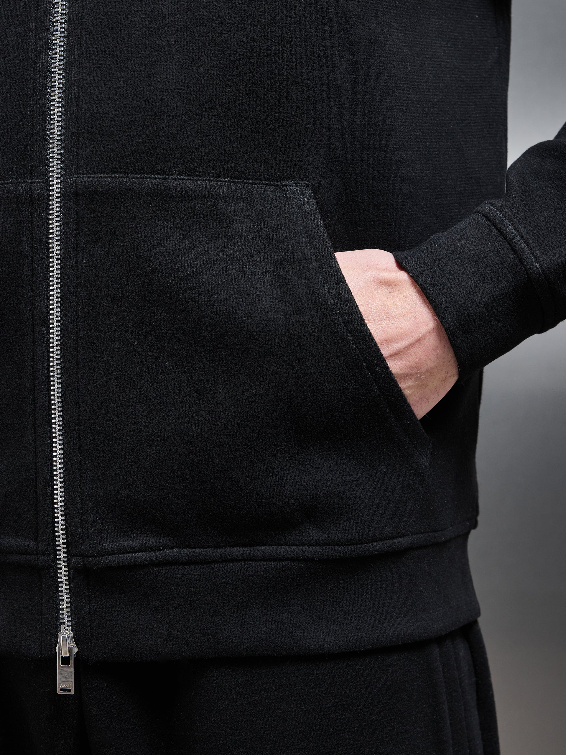 Relaxed Fit Knitted Zip Through Hoodie in Black