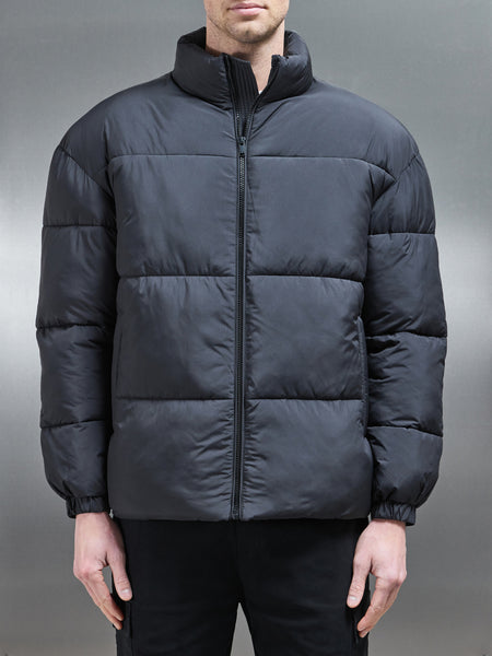 Relaxed Funnel Neck Puffer Jacket in Black