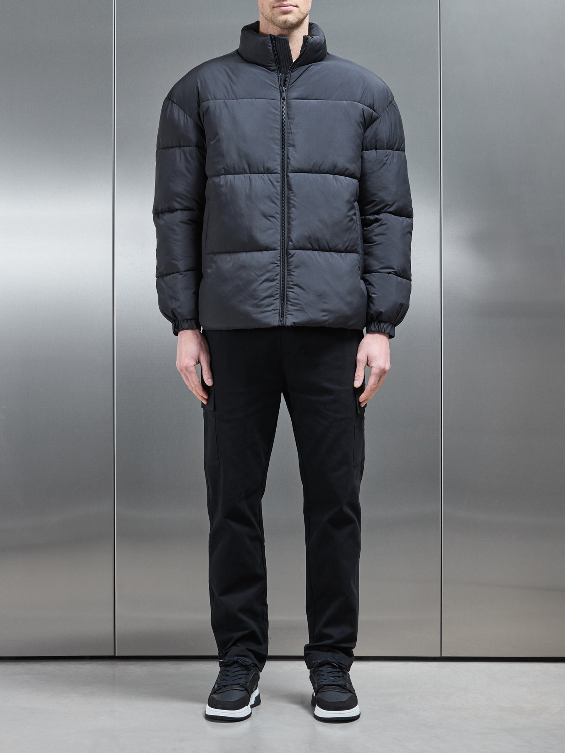 Relaxed Funnel Neck Puffer Jacket in Black