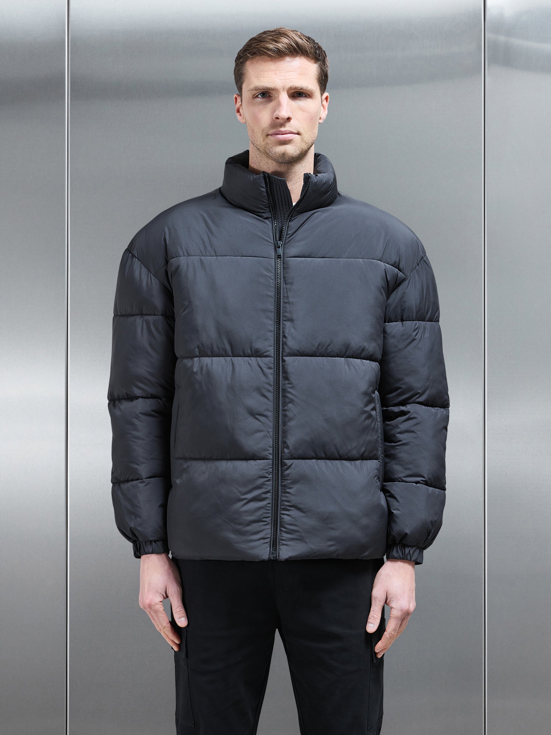 Relaxed Funnel Neck Puffer Jacket in Black